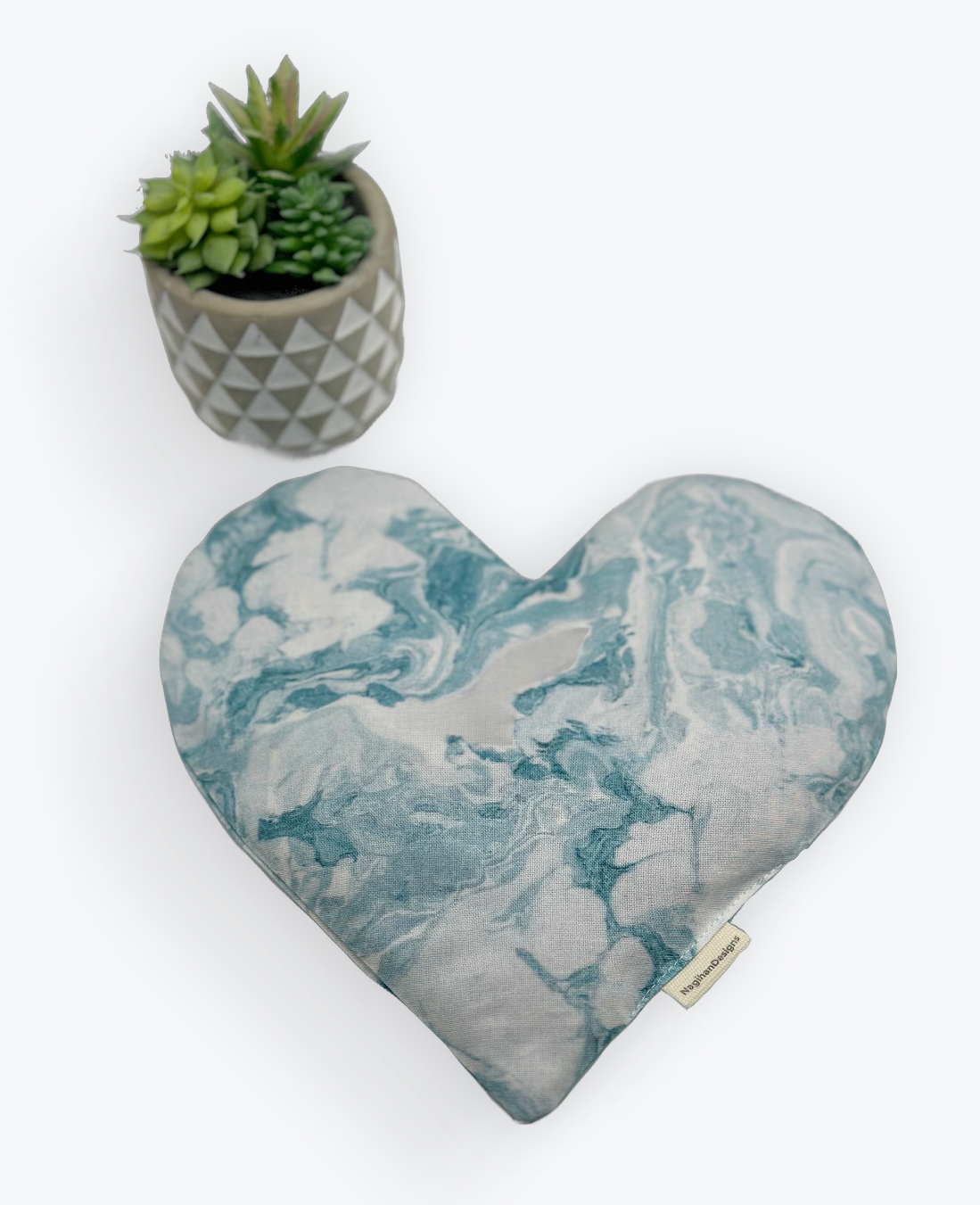 Turquoise  and white colored tie dye fabric heart shaped eye pillow