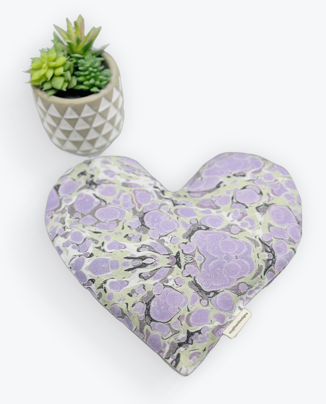 purple, gray and cream colored tie dye fabric heart shaped eye pillow