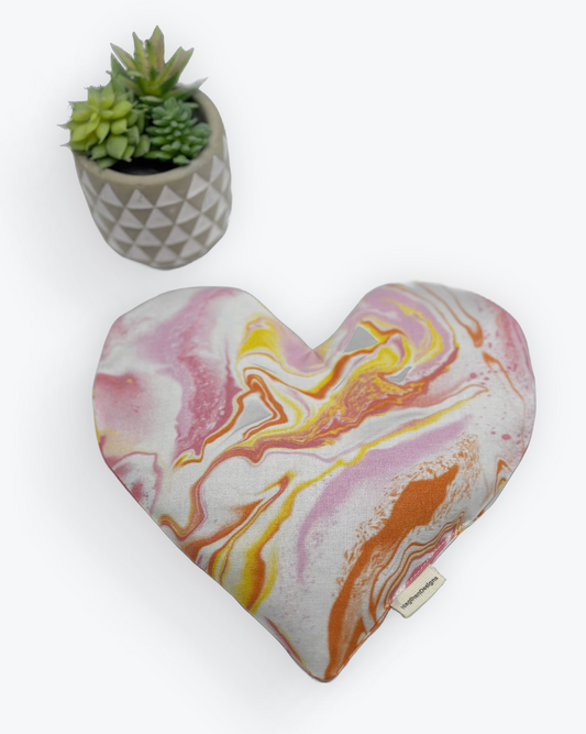 yellow, pink and light brown colored tie dye fabric heart shaped eye pillow